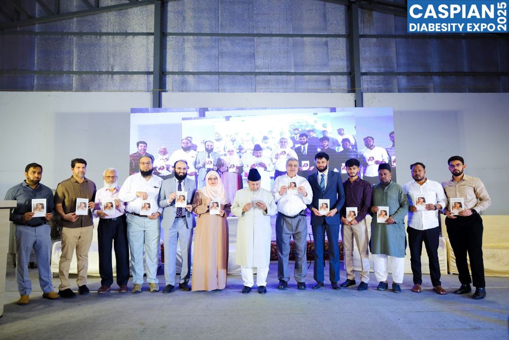 Dignitaries launching a patient guide on stage