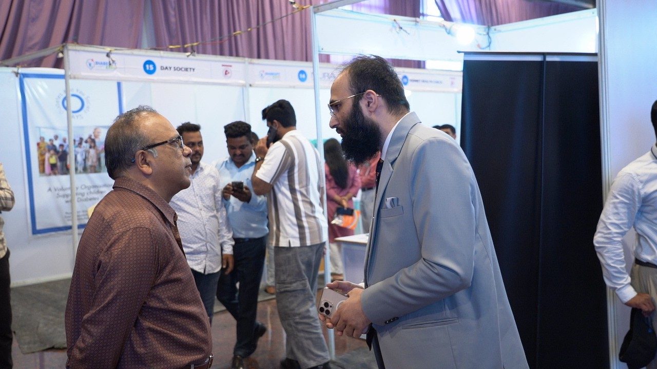Visitors at the exhibition stalls